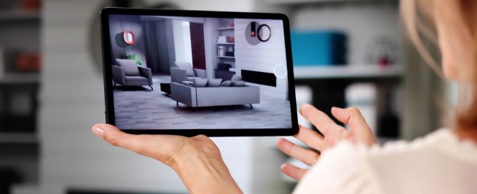 Woman holding an iPad displaying an interactive 3D virtual home tour, showing living room
